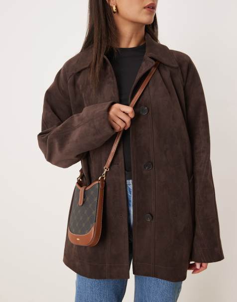 Mango monogram print cross body bag in brown - view 1