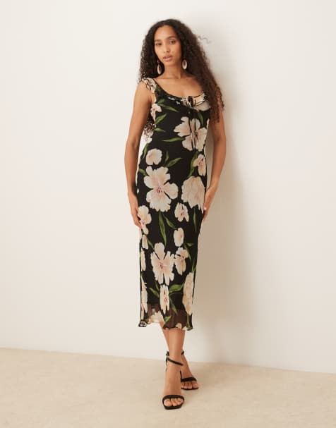 Mango - Mouwloze maxi jurk met ruches en bloemenprint op een donkere ondergrond - view 1