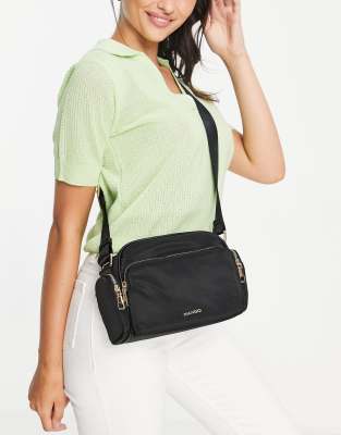 multi compartment cross body bag