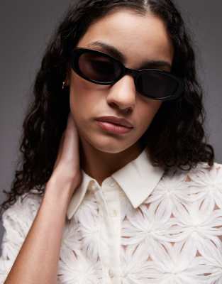 Mango - Ovale Sonnenbrille in Schwarz