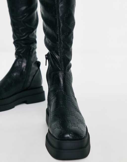 Embossed boots outlet