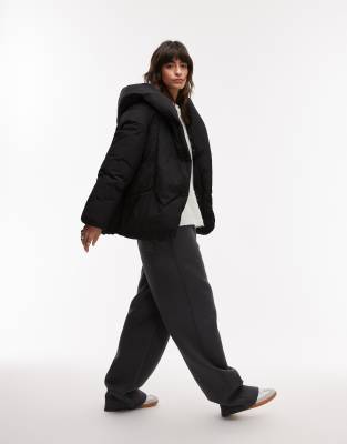 Mango - Oversize-Puffermantel in Schwarz mit lockerem Schnitt und Kragen