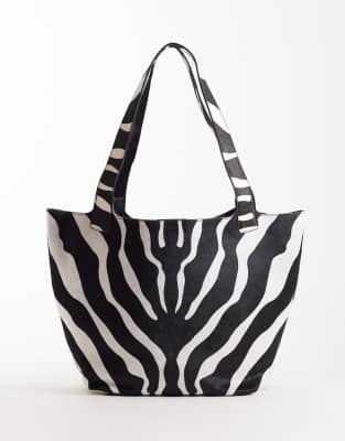 Mango - Oversize-Tragetasche aus Leder in Ponyfelloptik mit Zebramuster-Schwarz