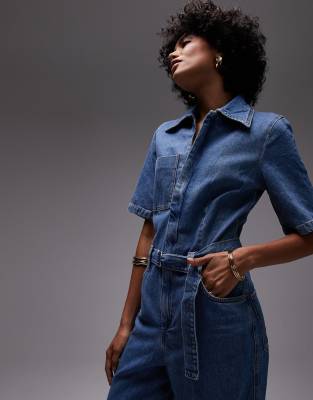 Shop Mango Oversized Short Sleeve Belted Denim Jumpsuit In Blue
