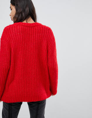 red knitted jumper