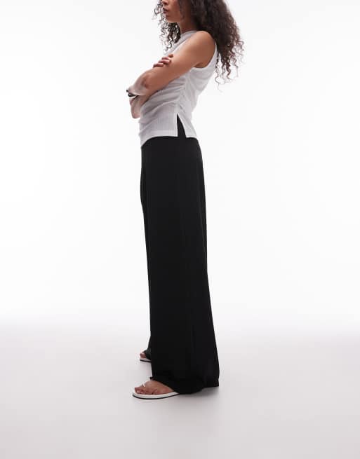 Mango - Pantaloni con fondo ampio e vita elasticizzata neri, 4 di 5
