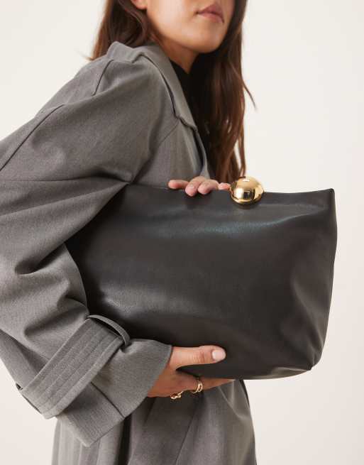 Mango - Pochette grande nera 100% pelle con chiusura con dettagli dorati