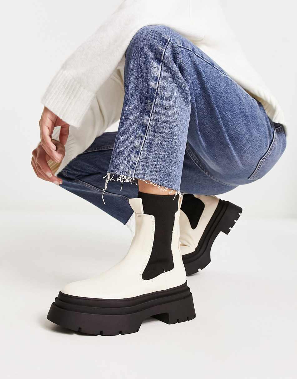 <b>Mango</b> pull on boots in cream and black colourblock, 1 of 4.