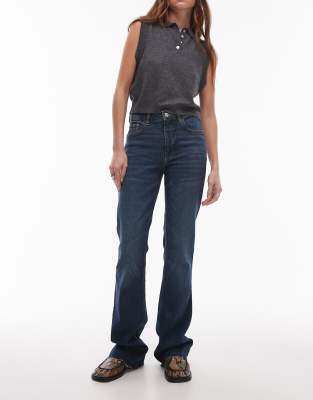 Mango raw hem flare leg jeans in mid blue