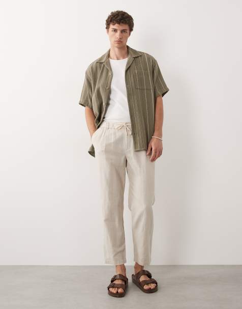 Mango – Relaxed-Fit-Hose aus Leinenmix in Ecru mit elastischem Kordelzugbund - view 1
