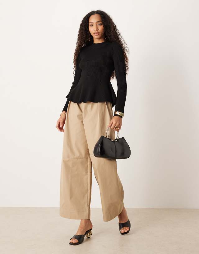 Mango ribbed knitted top with peplum hem in black | ASOS