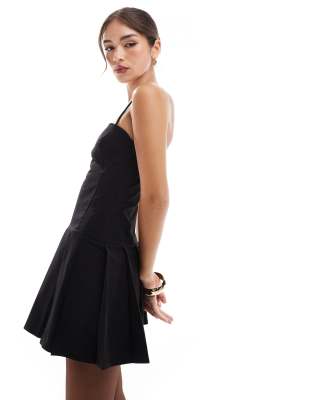 Mango - Robe caraco courte avec jupe plissée - Noir