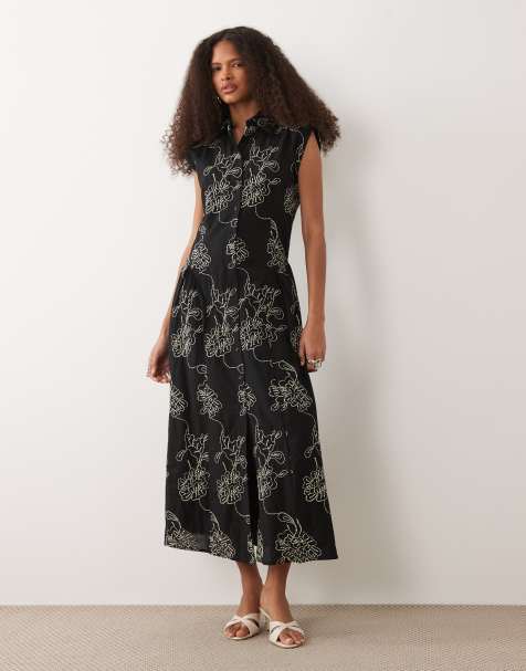 Mango - Robe chemise mi-longue et sans manches à broderies - Noir - view 1