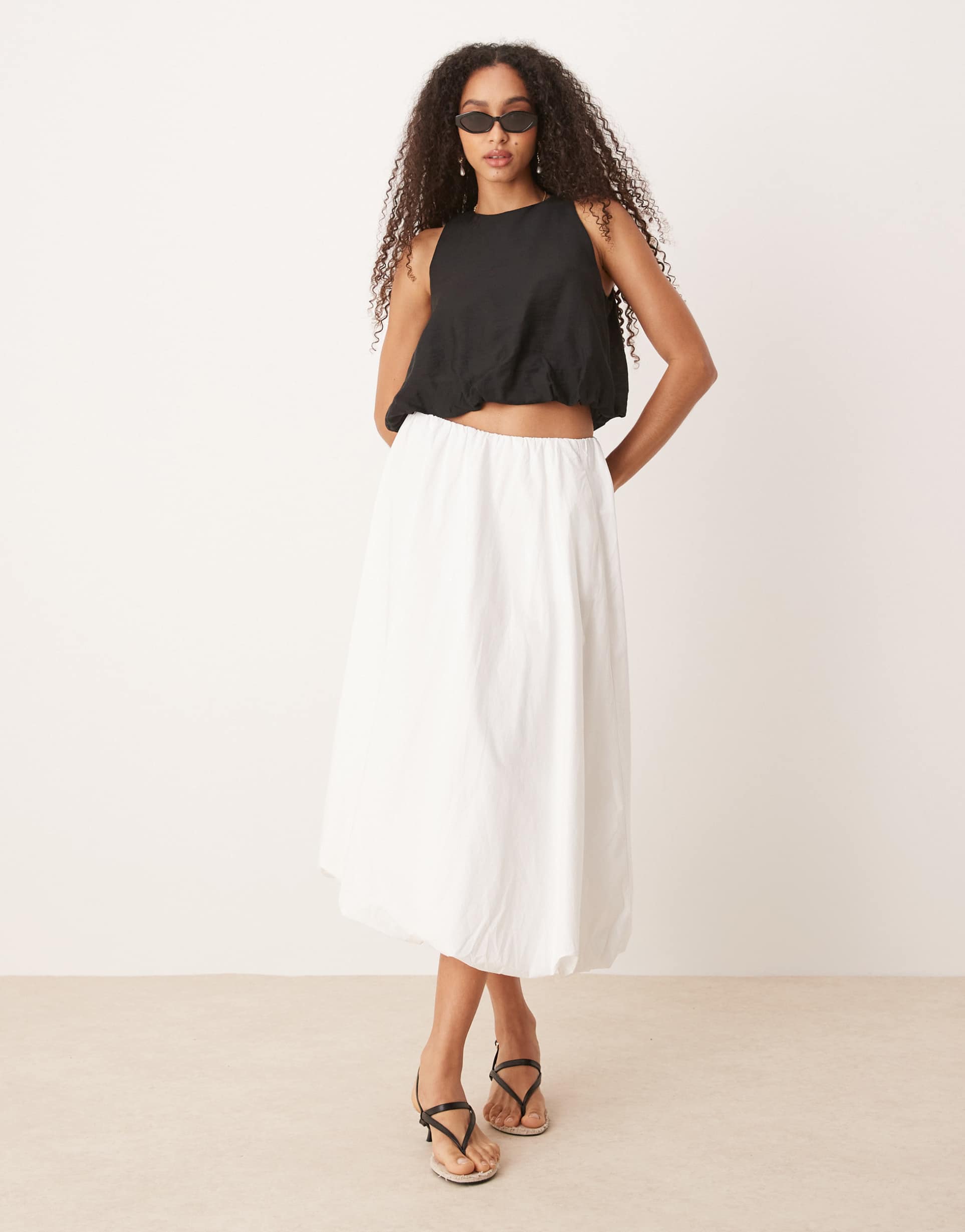 mango round neck sleeveless soft bubble hem top in black