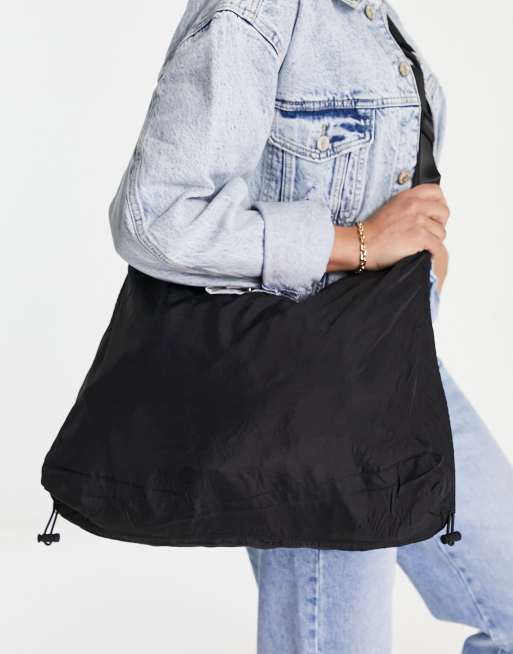 Mango - Ruimvallende crossbody tas in zwart