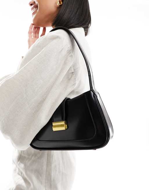 Mango – Schultertasche in Schwarz mit Schnallendetail