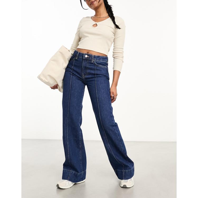 Pantalones flare online mango