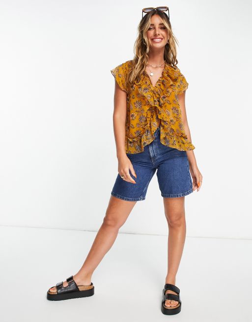 Mango – Senapsgul blus med volang framtill