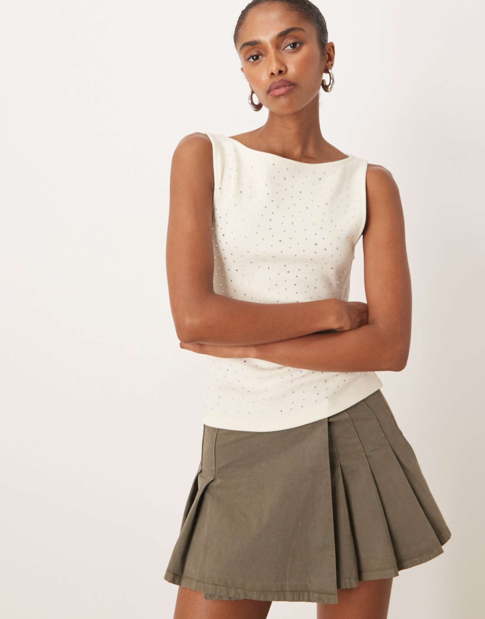 Белый топ без рукавов с блестками Mango