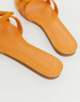 orange slip on sandals