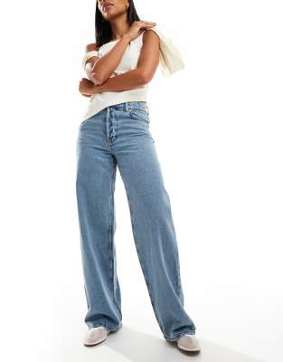 slouchy straight leg jeans in light blue wash