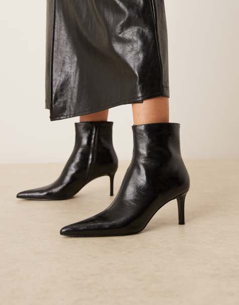 Mango – Stiefel aus strukturiertem Kunstleder in Schwarz mit spitz zulaufendem Absatz - view 1