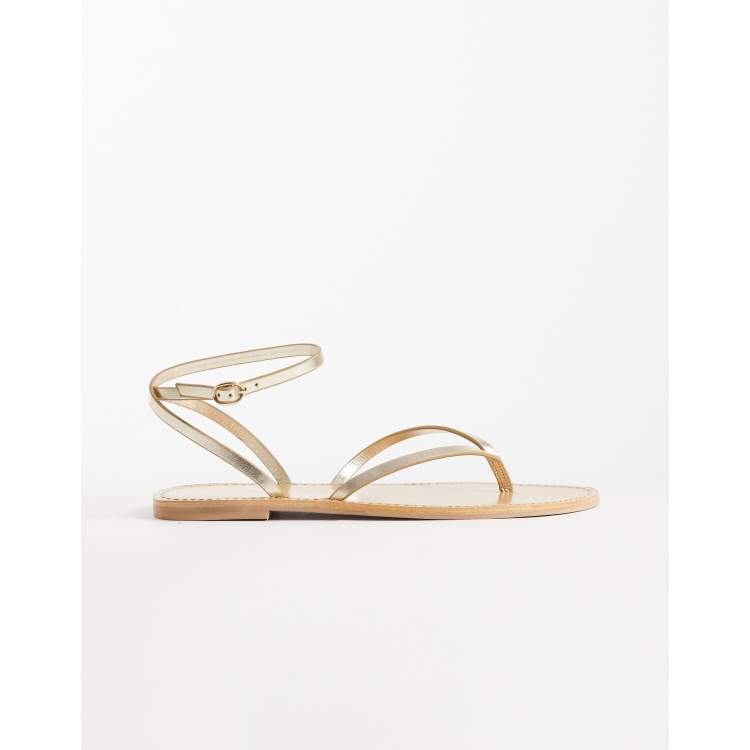 gold flat dress sandals Loeffler Randall Daphne Pleated Gold Bow Slide main image 1
