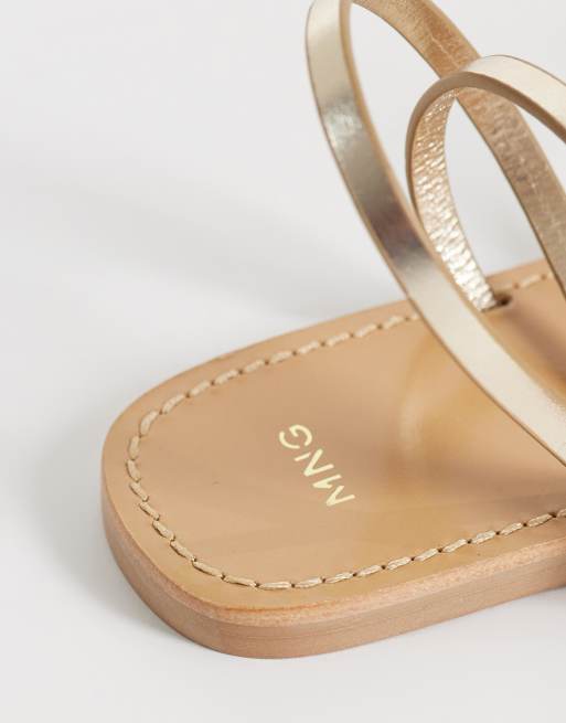Mango strappy flat sandals in gold | ASOS