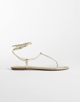 Mango Strappy Flat Toe Post Sandals In Gold