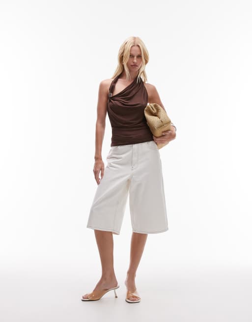 Mango summer collection featuring Kaia Gerber slinky backless halter top with metal detail in chocolate 