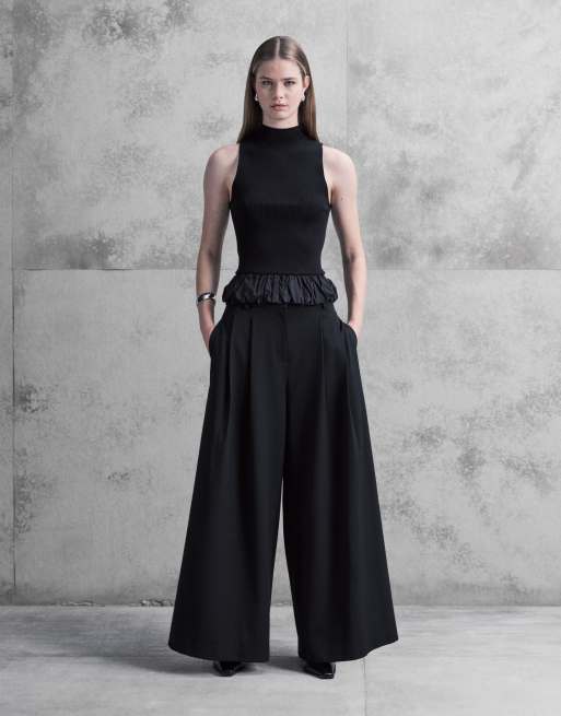 Mango – Svart, ärmlös topp i peplum-modell med hög krage, 2 av 4
