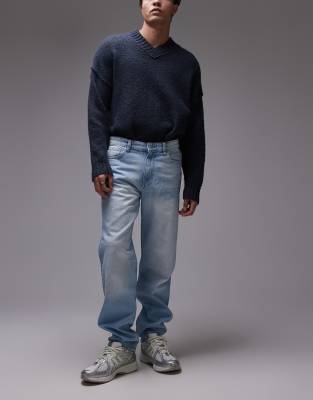 tapered fit jeans in light blue