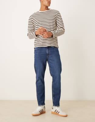 tapered jeans in dark blue