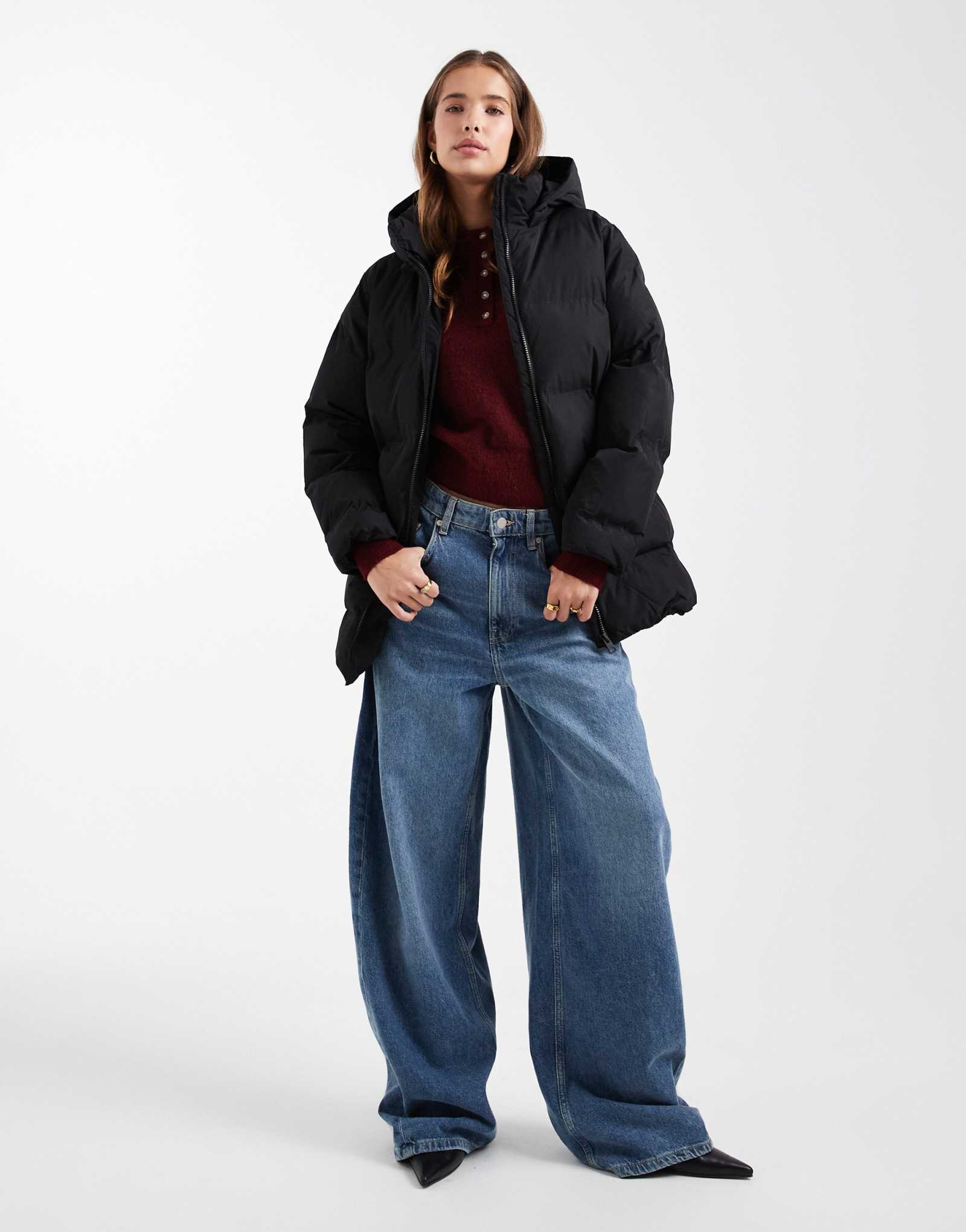 Подростковое пуховое пальто средней длины Mango Teen черного цвета 