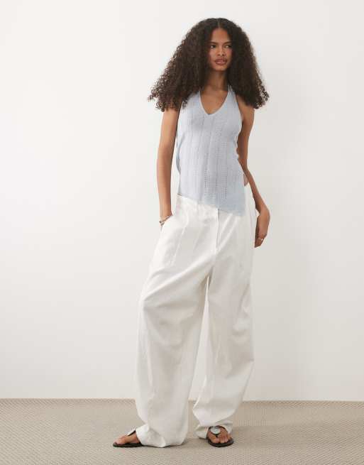 Mango Teen – Srebrny, dzianinowy top z dekoltem halter i asymetrycznym dołem, 2 z 4