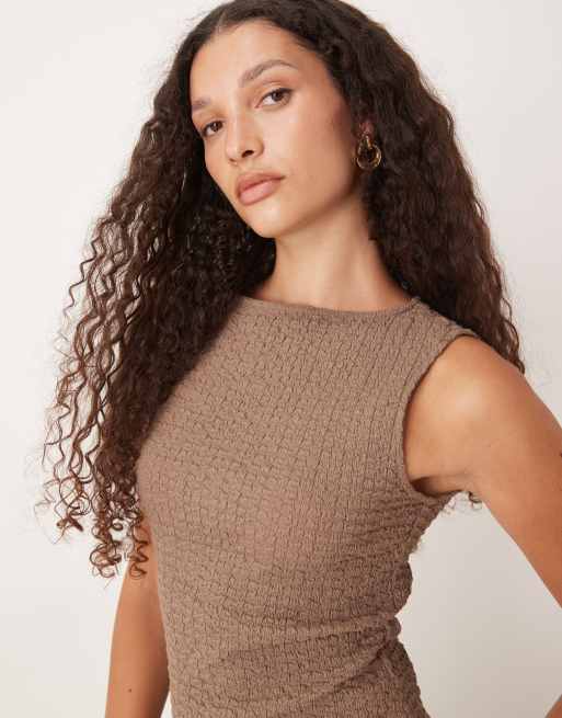 mango beige dress The power of a dress with clean lines and fluid beige in motion: a piece  that speaks volumes with the essential. Shop understated elegance at  https://go.mango/newnow Dress: 17051245 Bracelet: 17081192 Scarve: 87037692  #