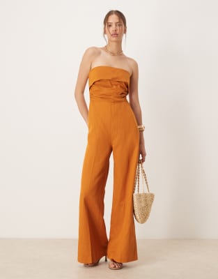 Mango - Trägerloser Jumpsuit aus Leinenmix in kräftigem Orange
