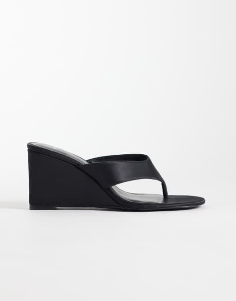 Mango wedge heeled flip flops in black - view 1