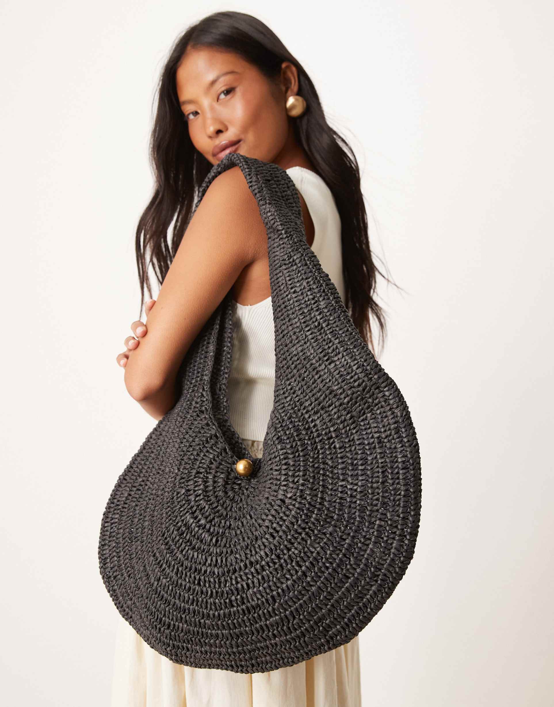 mango woven scoop shoulder bag with gold tone accent in black