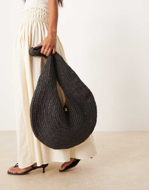 Mango woven scoop shoulder bag with gold tone accent in black