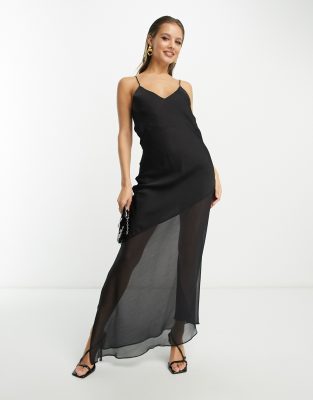 Mango x Camille - Kleid in Schwarz mit transparentem, asymmetrischem Rock und V-Ausschnitt-Black