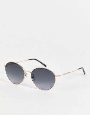 Marc Jacobs oval sunglasses in gold black