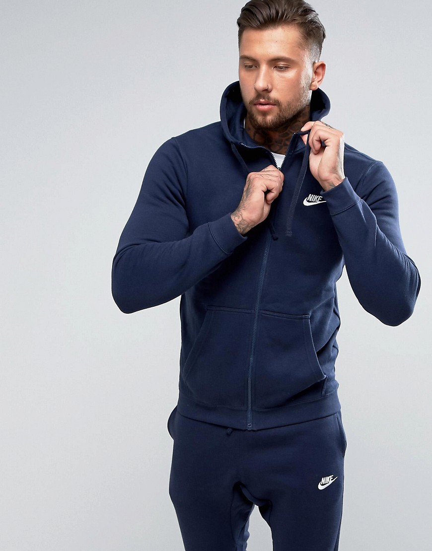 Marineblå hættetrøje med hellang lynlås fra Nike Club