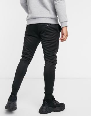 marshall artist track pants