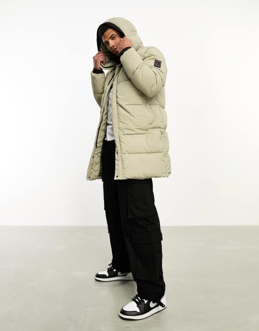 Marshall Artist – Lineare lange Steppjacke in Beige
