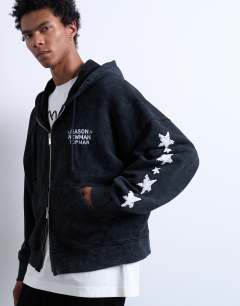 Model wearing Mason Newman x Topman boxy fit hoodie with cowgirl front and back print in washed black