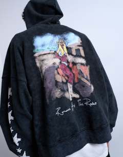 Model wearing Mason Newman x Topman boxy fit hoodie with cowgirl front and back print in washed black
