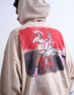Model wearing Mason Newman x Topman boxy fit hoodie with hotel bar front and back print in washed stone