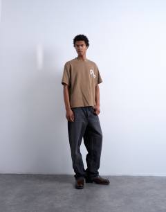Model wearing Mason Newman x Topman boxy fit t-shirt with heart front and back print in washed brown 