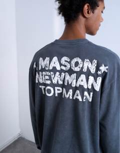 Model wearing Mason Newman x Topman oversized fit long sleeve t-shirt with cowboy boot front and back print in washed black